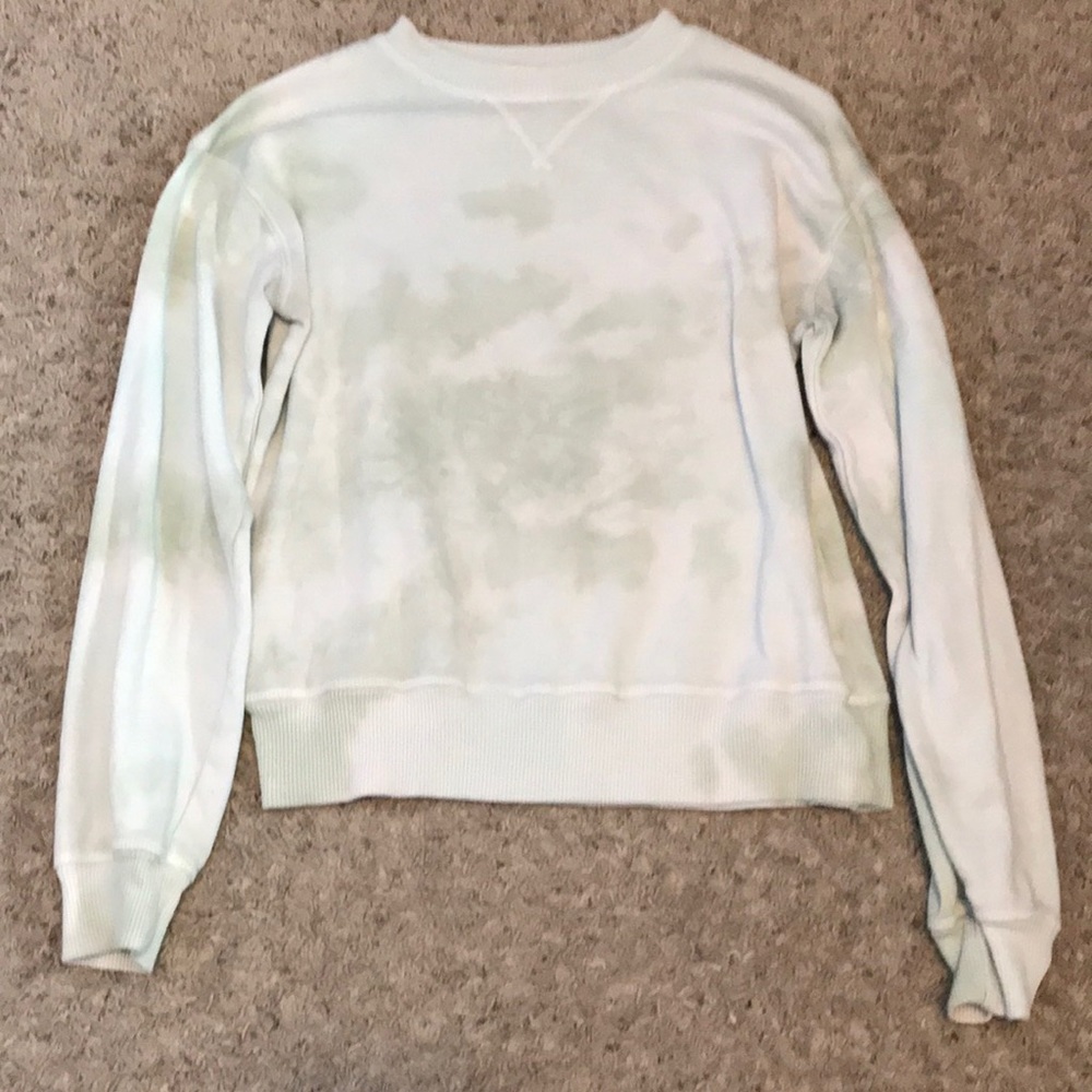 So brand sweater that is light green
